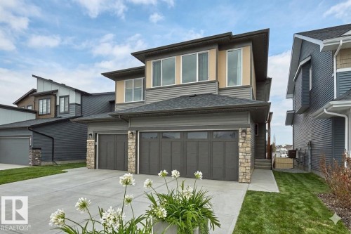 landscaping AI enhanced. Front landscaping is included in price - 5641 Hawthorn Way, Edmonton, AB - Outdoor