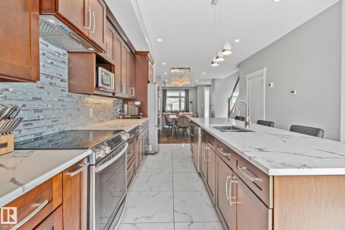 9855 79 Avenue, Edmonton, AB - Indoor Photo Showing Kitchen With Double Sink With Upgraded Kitchen