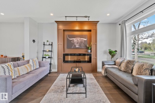 9855 79 Avenue, Edmonton, AB - Indoor Photo Showing Living Room With Fireplace