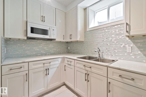 9855 79 Avenue, Edmonton, AB - Indoor Photo Showing Kitchen With Double Sink With Upgraded Kitchen