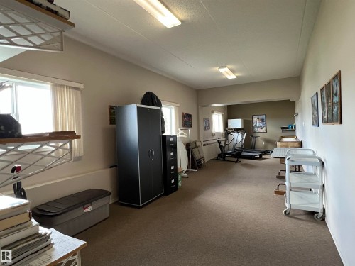 303 4004 47 Street, Drayton Valley, AB - Indoor Photo Showing Gym Room