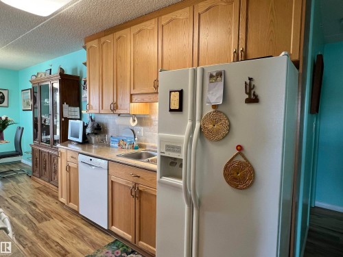 303 4004 47 Street, Drayton Valley, AB - Indoor Photo Showing Kitchen With Double Sink