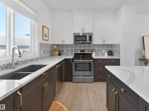 3608 8 Avenue, Edmonton, AB - Indoor Photo Showing Kitchen With Double Sink With Upgraded Kitchen