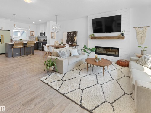 3608 8 Avenue, Edmonton, AB - Indoor Photo Showing Living Room With Fireplace