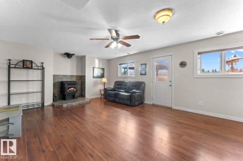 1938 Forest Drive, Cold Lake, AB - Indoor Photo Showing Living Room With Fireplace