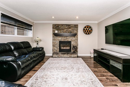 1044 106 Street, Edmonton, AB - Indoor Photo Showing Living Room With Fireplace