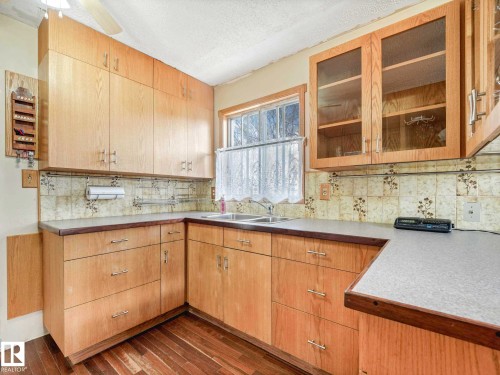34 Camelot Avenue, Leduc, AB - Indoor Photo Showing Kitchen With Double Sink