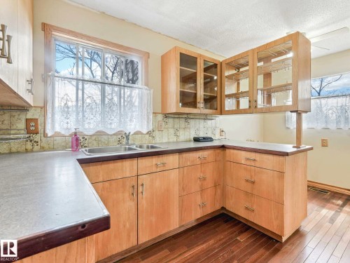 34 Camelot Avenue, Leduc, AB - Indoor Photo Showing Kitchen With Double Sink