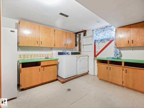 34 Camelot Avenue, Leduc, AB - Indoor Photo Showing Laundry Room