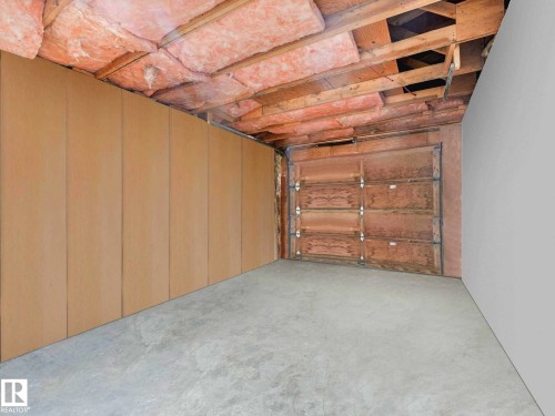 34 Camelot Avenue, Leduc, AB - Indoor Photo Showing Garage