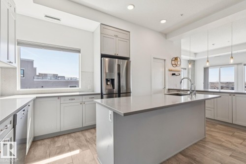 502 1316 Windermere Way, Edmonton, AB - Indoor Photo Showing Kitchen With Upgraded Kitchen