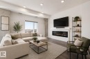 502 1316 Windermere Way, Edmonton, AB  - Indoor Photo Showing Living Room With Fireplace 