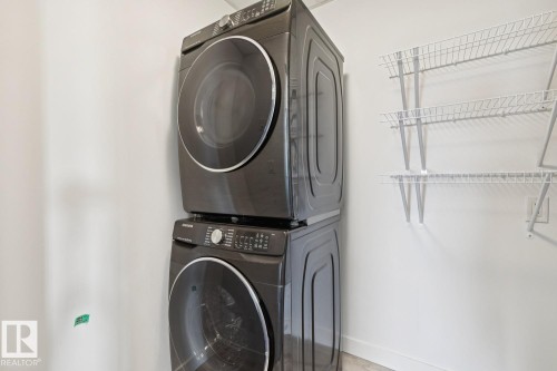 502 1316 Windermere Way, Edmonton, AB - Indoor Photo Showing Laundry Room