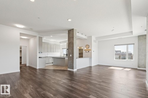 502 1316 Windermere Way, Edmonton, AB - Indoor Photo Showing Living Room