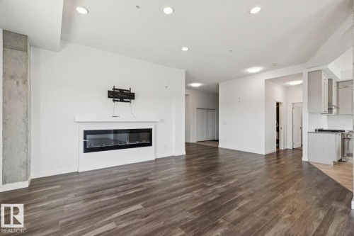 502 1316 Windermere Way, Edmonton, AB - Indoor With Fireplace