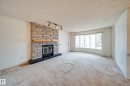 1030 106 Street, Edmonton, AB  - Indoor Photo Showing Living Room With Fireplace 