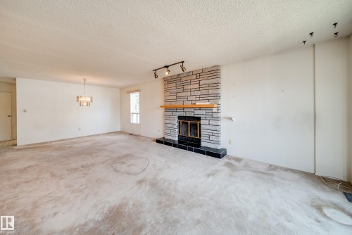 1030 106 Street, Edmonton, AB - Indoor Photo Showing Living Room With Fireplace