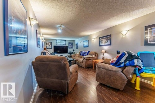 7012 44 Avenue, Edmonton, AB - Indoor Photo Showing Living Room