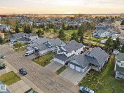 Aerial perspective showcasing a residential area with varied housing styles - 