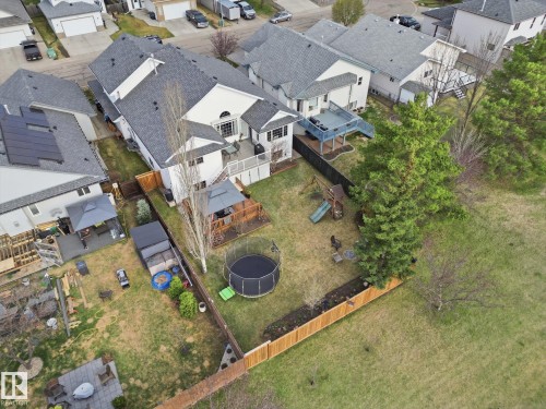 Two-story residence with a multi-level deck and fenced backyard - 1340 Oakland Crescent, Devon, AB - Outdoor With View