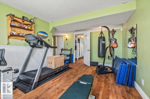 62 La Costa Fairway Close, Stony Plain, AB - Indoor Photo Showing Gym Room