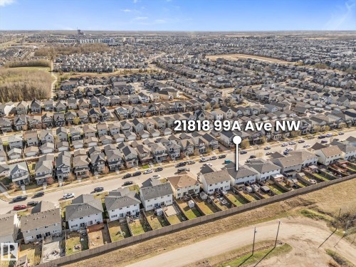 Aerial perspective showcasing a residential neighborhood with detached homes, each featuring individual backyards - 21818 99A Avenue, Edmonton, AB - Outdoor With View