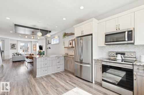 3813 111 Avenue, Edmonton, AB - Indoor Photo Showing Kitchen With Upgraded Kitchen
