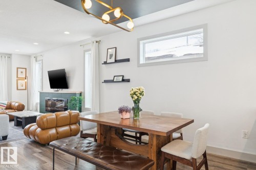 3813 111 Avenue, Edmonton, AB - Indoor Photo Showing Dining Room With Fireplace