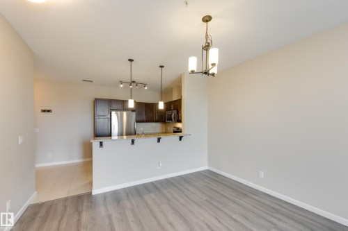 317 6083 Maynard Way, Edmonton, AB - Indoor Photo Showing Kitchen