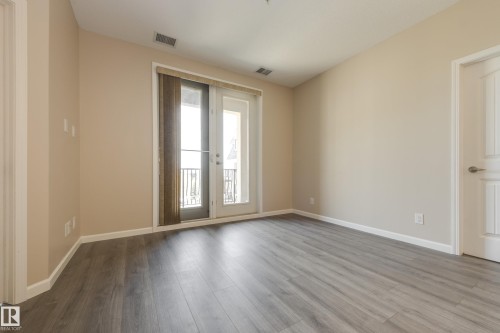 317 6083 Maynard Way, Edmonton, AB - Indoor Photo Showing Other Room