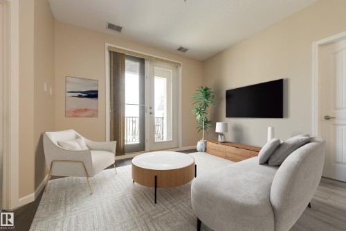 317 6083 Maynard Way, Edmonton, AB - Indoor Photo Showing Other Room