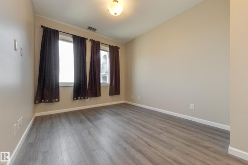 317 6083 Maynard Way, Edmonton, AB - Indoor Photo Showing Other Room
