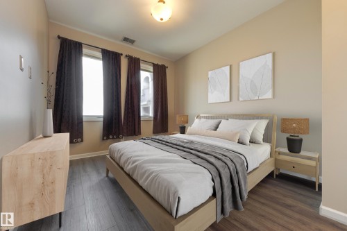 317 6083 Maynard Way, Edmonton, AB - Indoor Photo Showing Bedroom