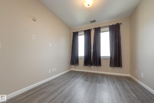 317 6083 Maynard Way, Edmonton, AB - Indoor Photo Showing Other Room