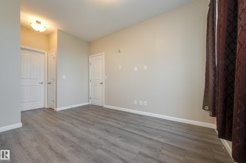 317 6083 Maynard Way, Edmonton, AB - Indoor Photo Showing Other Room