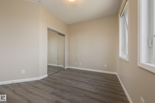 317 6083 Maynard Way, Edmonton, AB - Indoor Photo Showing Other Room
