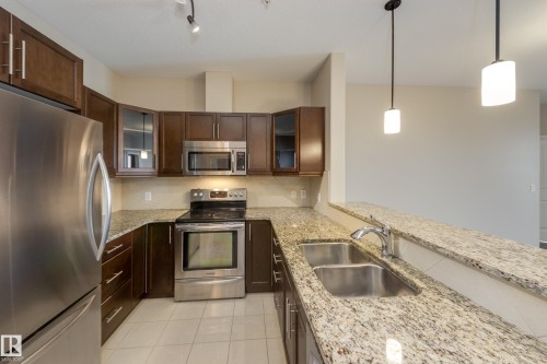 317 6083 Maynard Way, Edmonton, AB - Indoor Photo Showing Kitchen With Double Sink With Upgraded Kitchen