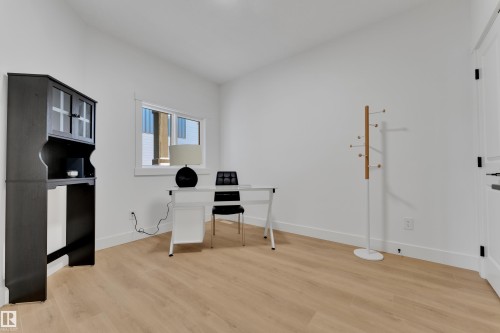 Room featuring light wood-finish flooring, white walls, and a window with white trim - 382 Linden Loop, Leduc, AB - Indoor