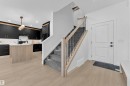 Open-concept living space with light wood-finish flooring - 259 Linden Loop, Leduc, AB  - Indoor 