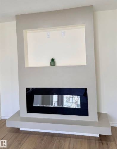 22 9703 174 Street Nw, Edmonton, AB - Indoor With Fireplace