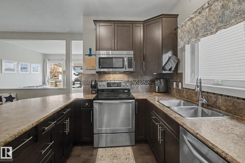 7363 179 Avenue, Edmonton, AB - Indoor Photo Showing Kitchen With Stainless Steel Kitchen With Double Sink