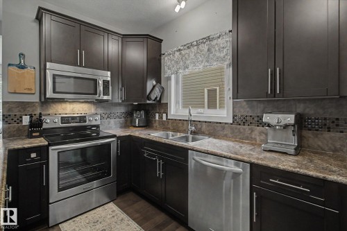 7363 179 Avenue, Edmonton, AB - Indoor Photo Showing Kitchen With Double Sink