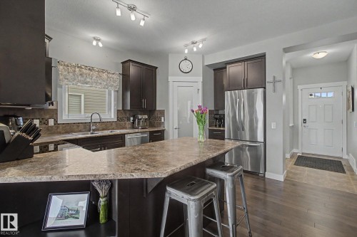 7363 179 Avenue, Edmonton, AB - Indoor Photo Showing Kitchen With Stainless Steel Kitchen With Upgraded Kitchen