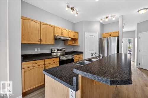 99 Birch Place, Fort Saskatchewan, AB - Indoor Photo Showing Kitchen With Double Sink