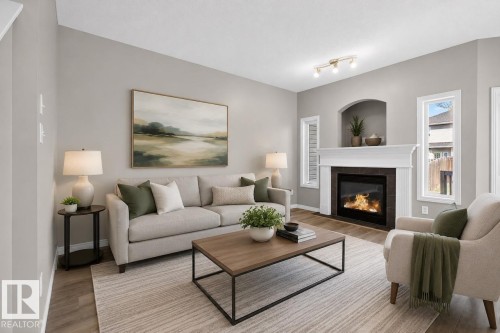 99 Birch Place, Fort Saskatchewan, AB - Indoor Photo Showing Living Room With Fireplace