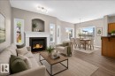 99 Birch Place, Fort Saskatchewan, AB  - Indoor Photo Showing Living Room With Fireplace 