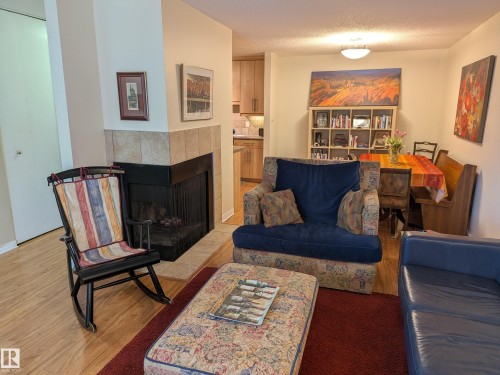 1870 111A Street, Edmonton, AB - Indoor Photo Showing Living Room With Fireplace