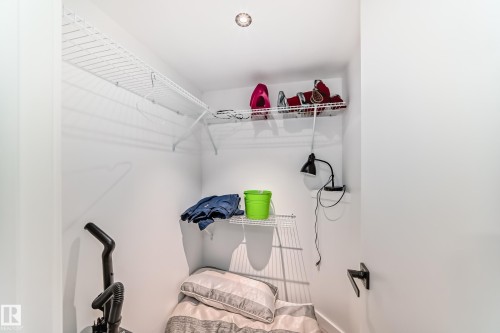 Compact storage area featuring white walls and a recessed ceiling light - 5263 47 Ave, Calmar, AB - Indoor With Storage
