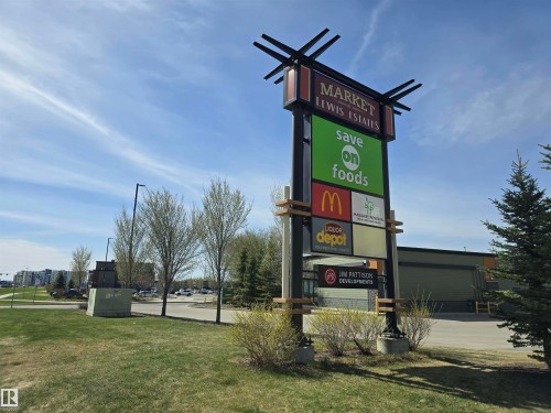 Prominent multi-tenant pylon sign featuring multiple business advertisements - 21321 94 Avenue, Edmonton, AB - Outdoor