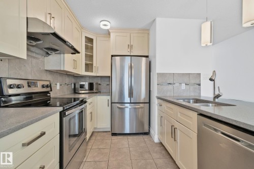 10813 66 Avenue, Edmonton, AB - Indoor Photo Showing Kitchen With Double Sink With Upgraded Kitchen